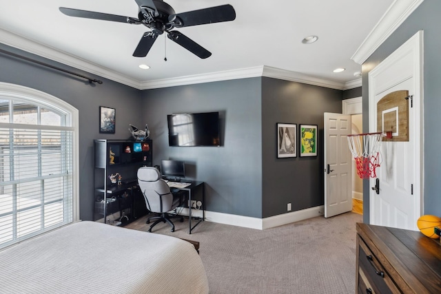 carpeted bedroom with ornamental molding and ceiling fan