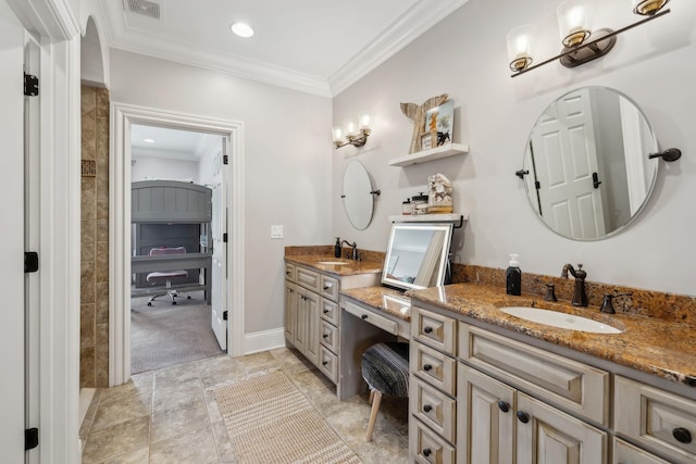 bathroom with vanity and ornamental molding