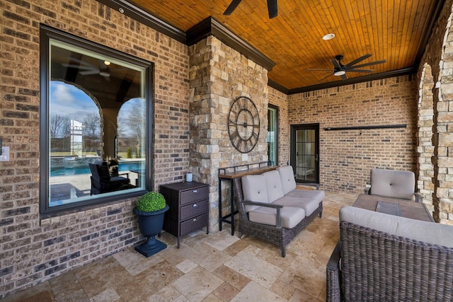 view of patio / terrace featuring an outdoor living space and ceiling fan