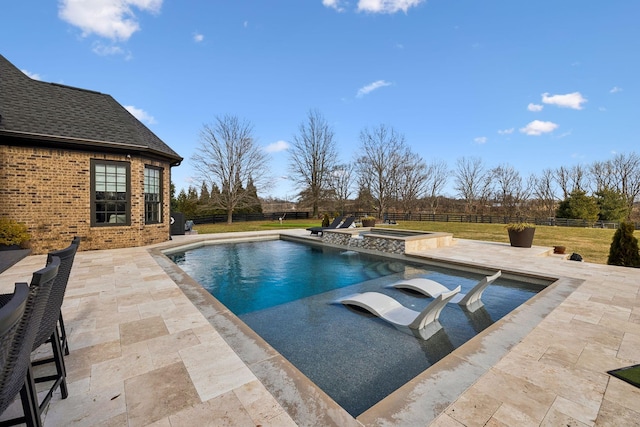 view of swimming pool featuring an in ground hot tub and a patio area