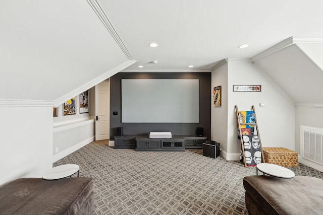 carpeted cinema room with crown molding