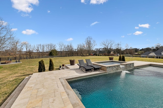 view of pool with an in ground hot tub, pool water feature, a lawn, and a patio area