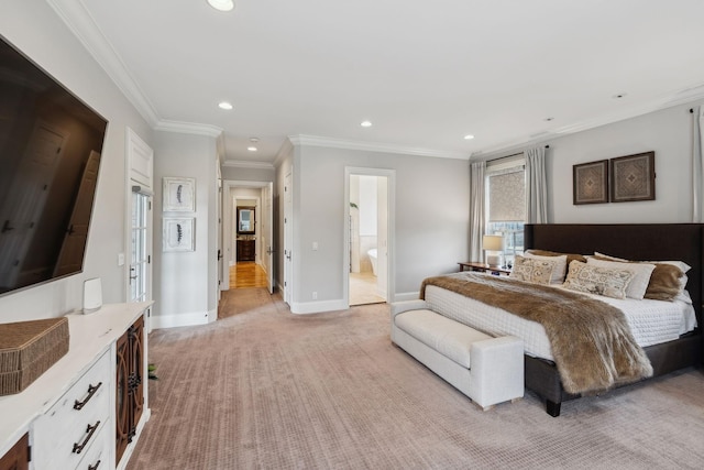 carpeted bedroom featuring crown molding and connected bathroom