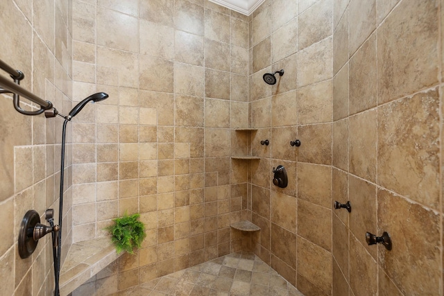 bathroom with a tile shower