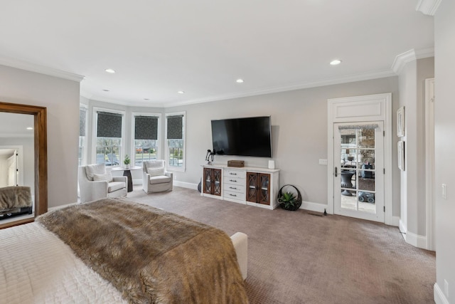 carpeted bedroom with ornamental molding