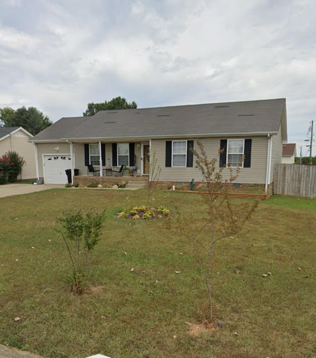 single story home featuring a front yard, a garage, and a porch