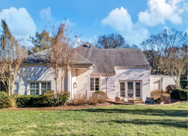 exterior space with a front yard