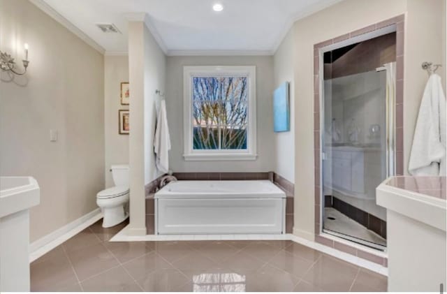 bathroom with tile patterned flooring, ornamental molding, independent shower and bath, and toilet