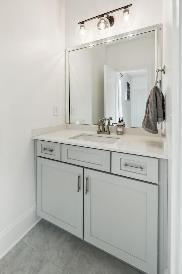 bathroom featuring tile patterned floors and vanity