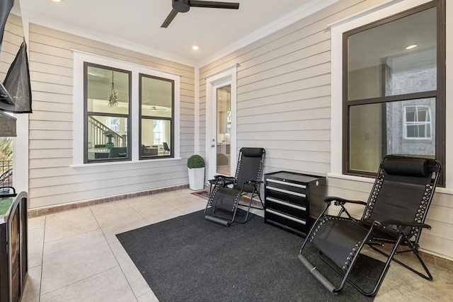 view of patio featuring ceiling fan