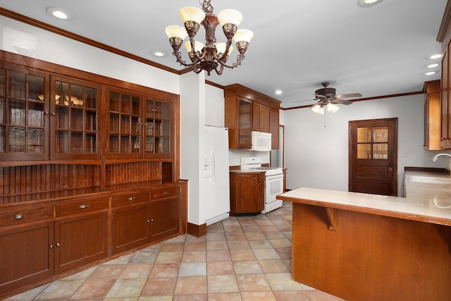 kitchen featuring white appliances, decorative light fixtures, ornamental molding, kitchen peninsula, and ceiling fan