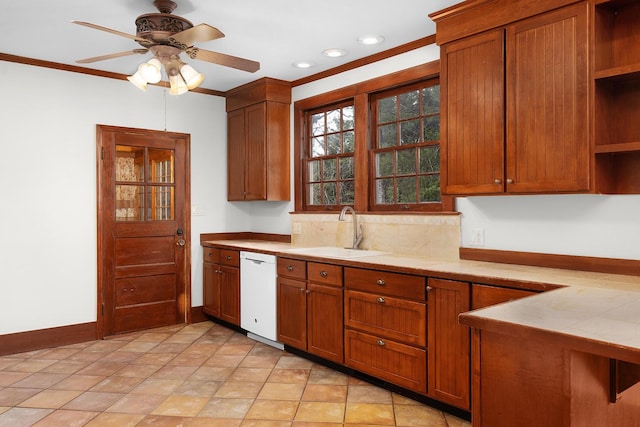 kitchen with sink, backsplash, ornamental molding, ceiling fan, and white dishwasher