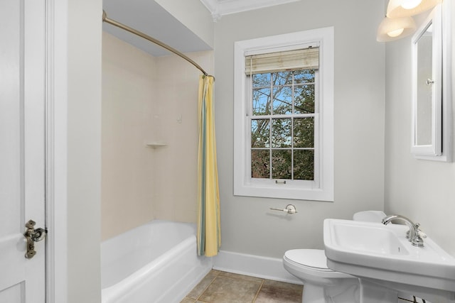 full bathroom with tile patterned flooring, sink, toilet, and shower / bath combo