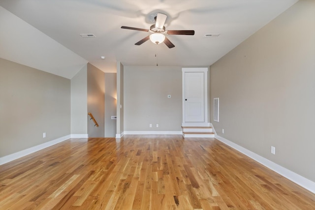 spare room featuring ceiling fan and light wood-type flooring