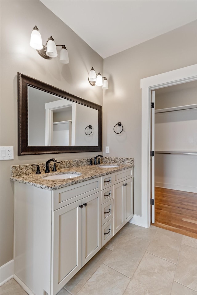 bathroom featuring vanity and tile patterned floors