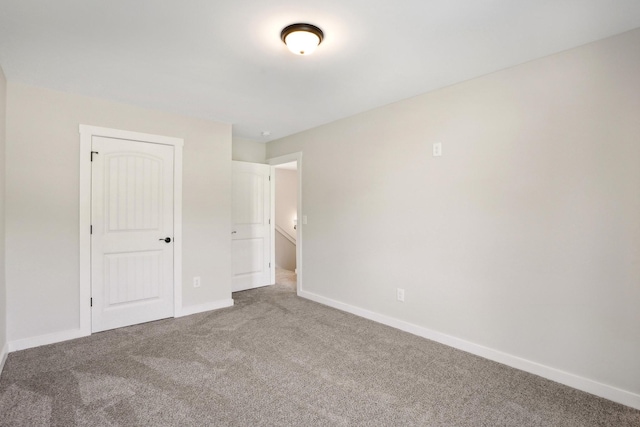 unfurnished bedroom featuring carpet flooring