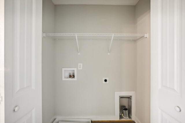 laundry area with hookup for a washing machine and electric dryer hookup