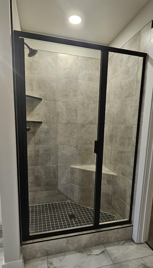 bathroom with an enclosed shower