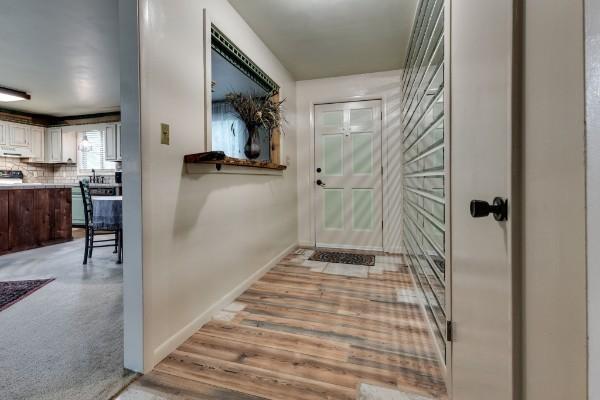 doorway featuring light wood-type flooring