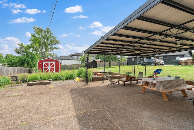 view of patio featuring a storage shed