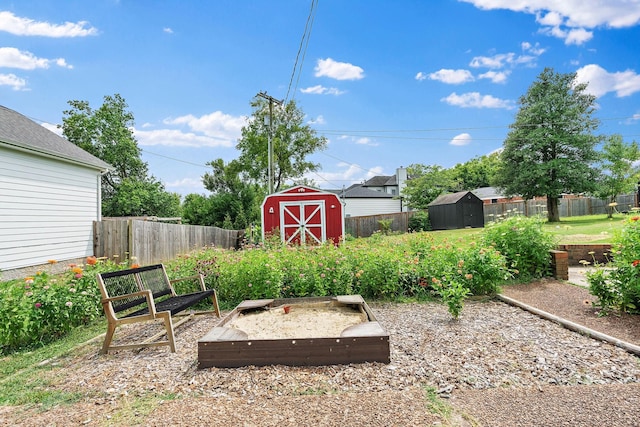 view of yard with a storage unit