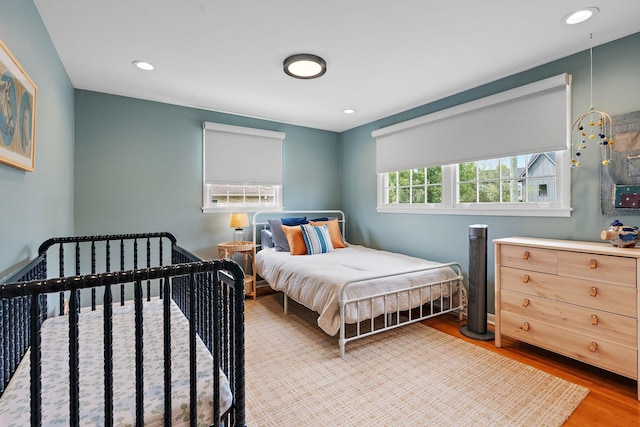 bedroom featuring light hardwood / wood-style floors