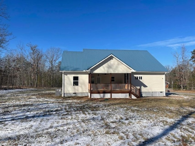 view of snow covered property