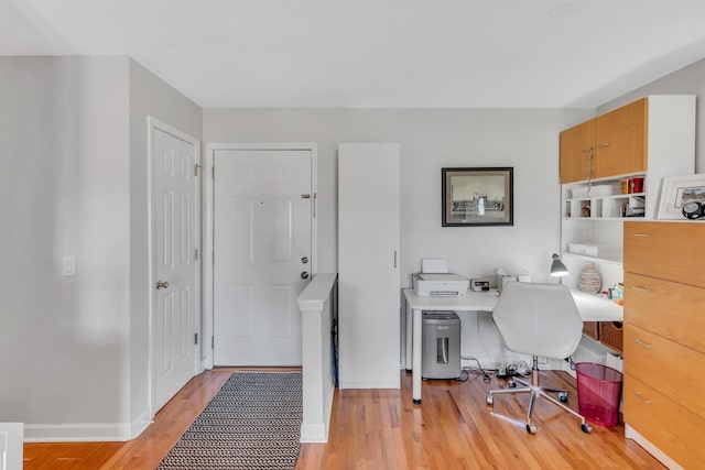 office area with light hardwood / wood-style flooring