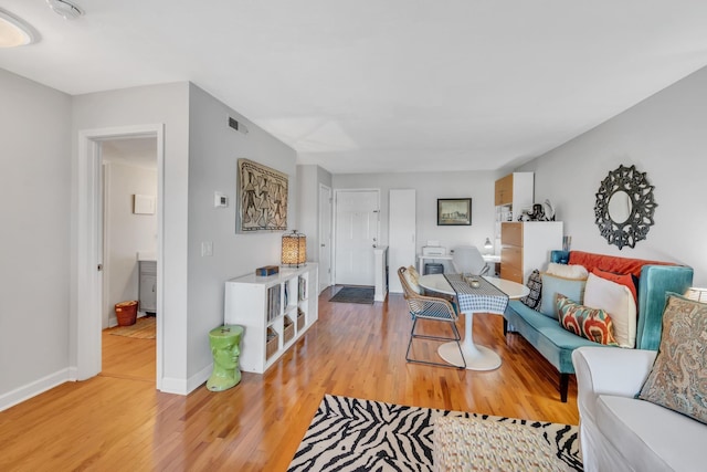 living room featuring light wood-type flooring