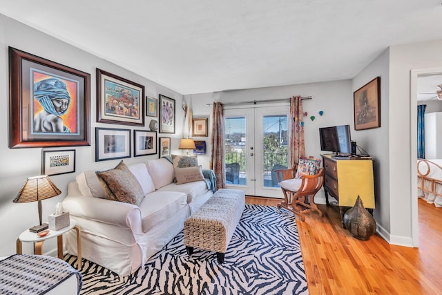 living room featuring hardwood / wood-style floors and french doors