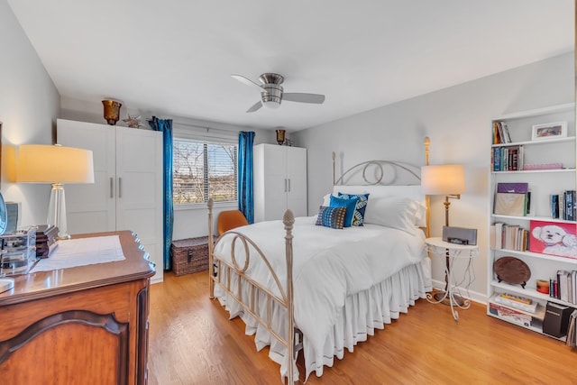 bedroom featuring ceiling fan and light hardwood / wood-style flooring