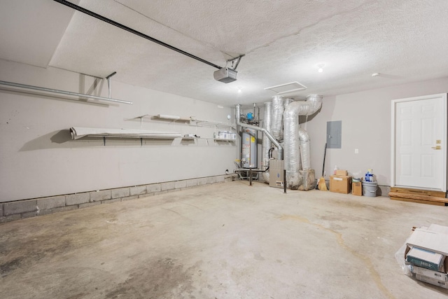 garage featuring a garage door opener, gas water heater, and electric panel