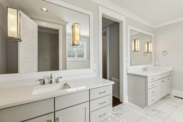 bathroom featuring vanity and ornamental molding