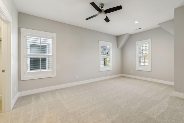 empty room with light carpet and ceiling fan