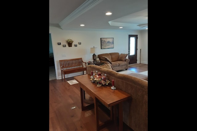 living room with ornamental molding, hardwood / wood-style floors, and ceiling fan