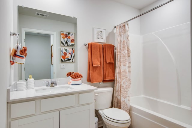 full bathroom with vanity, shower / bathtub combination with curtain, and toilet