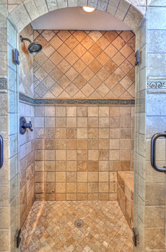 bathroom with an enclosed shower