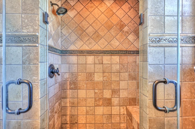 bathroom featuring an enclosed shower