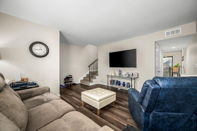 living room featuring dark hardwood / wood-style floors