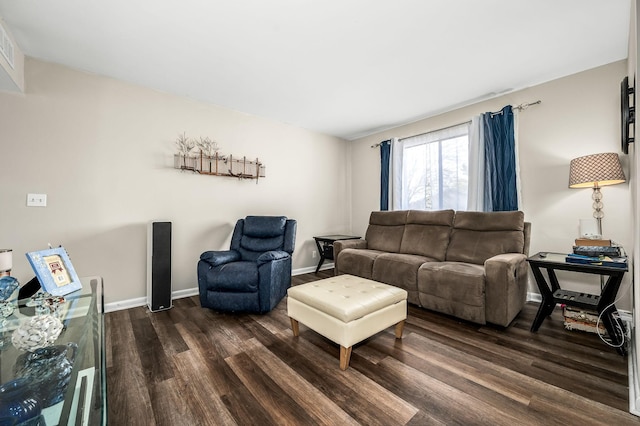 living room with dark hardwood / wood-style floors