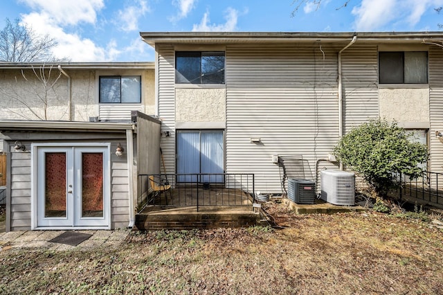 back of property with cooling unit and french doors