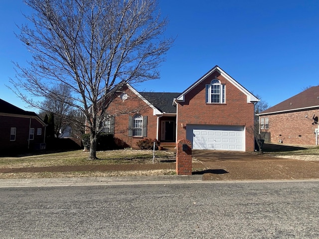 front of property with a garage