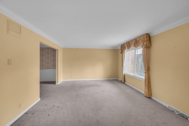 unfurnished room featuring ornamental molding and light carpet