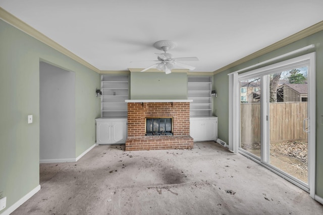 unfurnished living room featuring a brick fireplace, crown molding, and ceiling fan