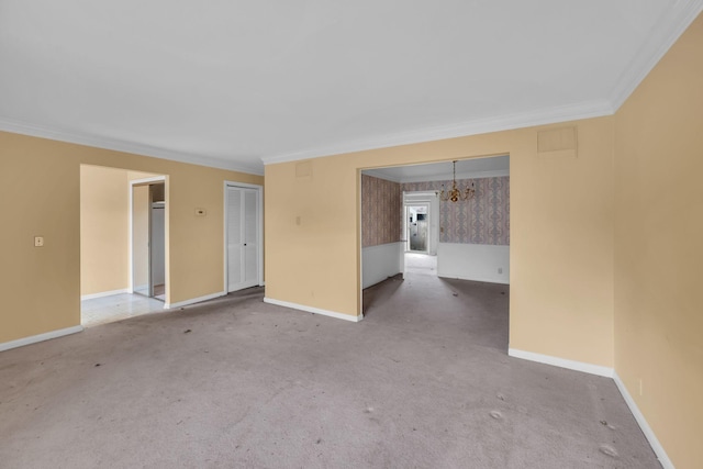 unfurnished room with light colored carpet and ornamental molding