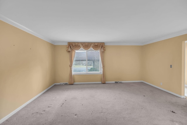 unfurnished room with crown molding and carpet flooring