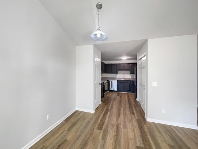 interior space featuring sink and dark hardwood / wood-style flooring