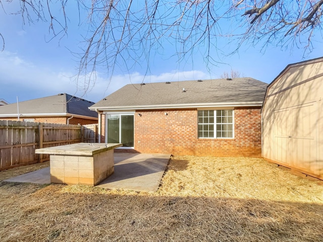 rear view of property with a patio area