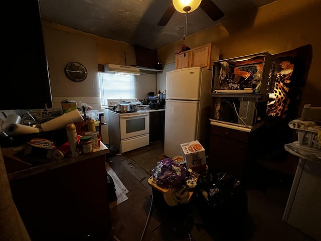 kitchen with light brown cabinetry, white appliances, dark wood-type flooring, and ceiling fan