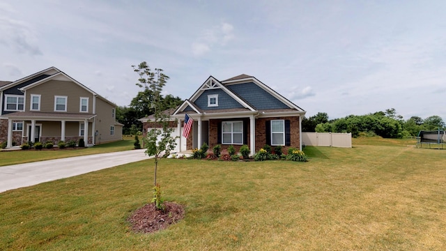 craftsman house featuring a front yard and covered porch